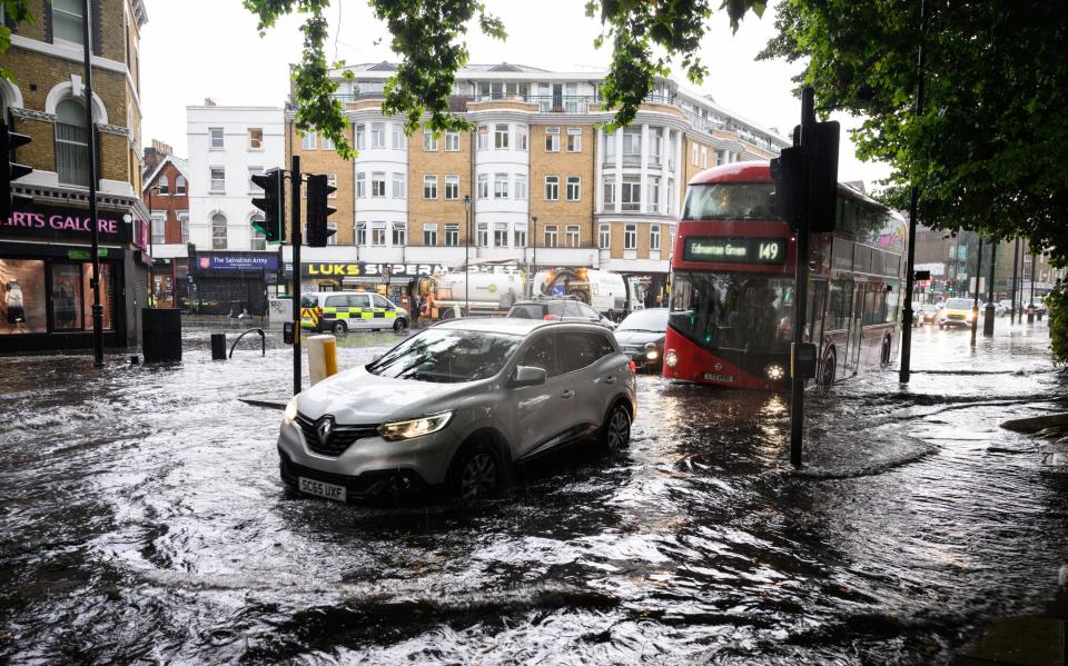 Roads were flooded in London when torrential rain and thunderstorms hit the country in August 2022 - Getty 