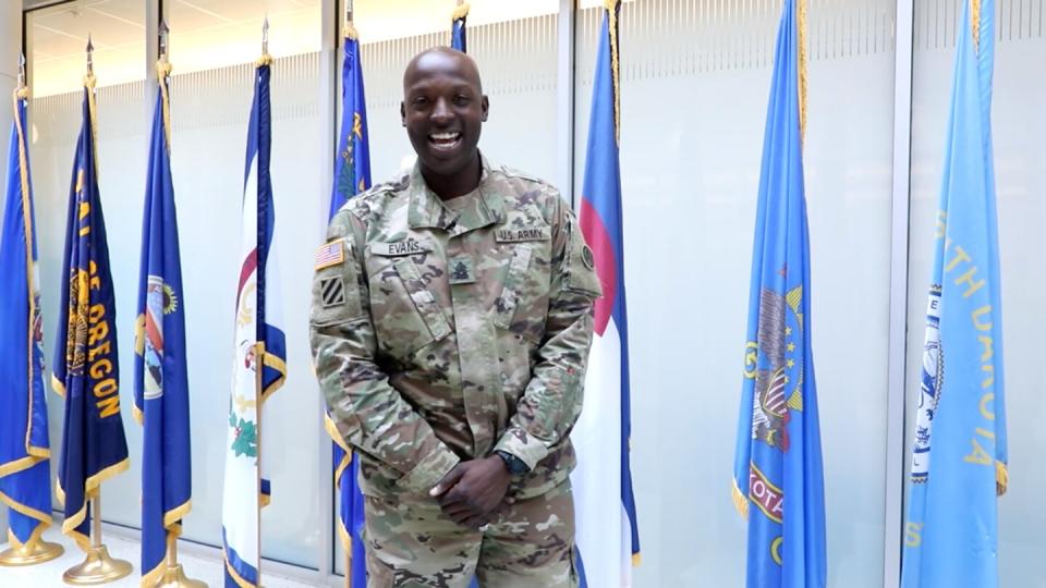 Command Sgt. Maj. Carlos Evans, the senior enlisted leader for U.S. Army Central's headquarters battalion, grins during a West Point football support video filmed November 18, 2021, at Shaw Air Force Base, South Carolina. (Spc. Amber Cobena/Army)