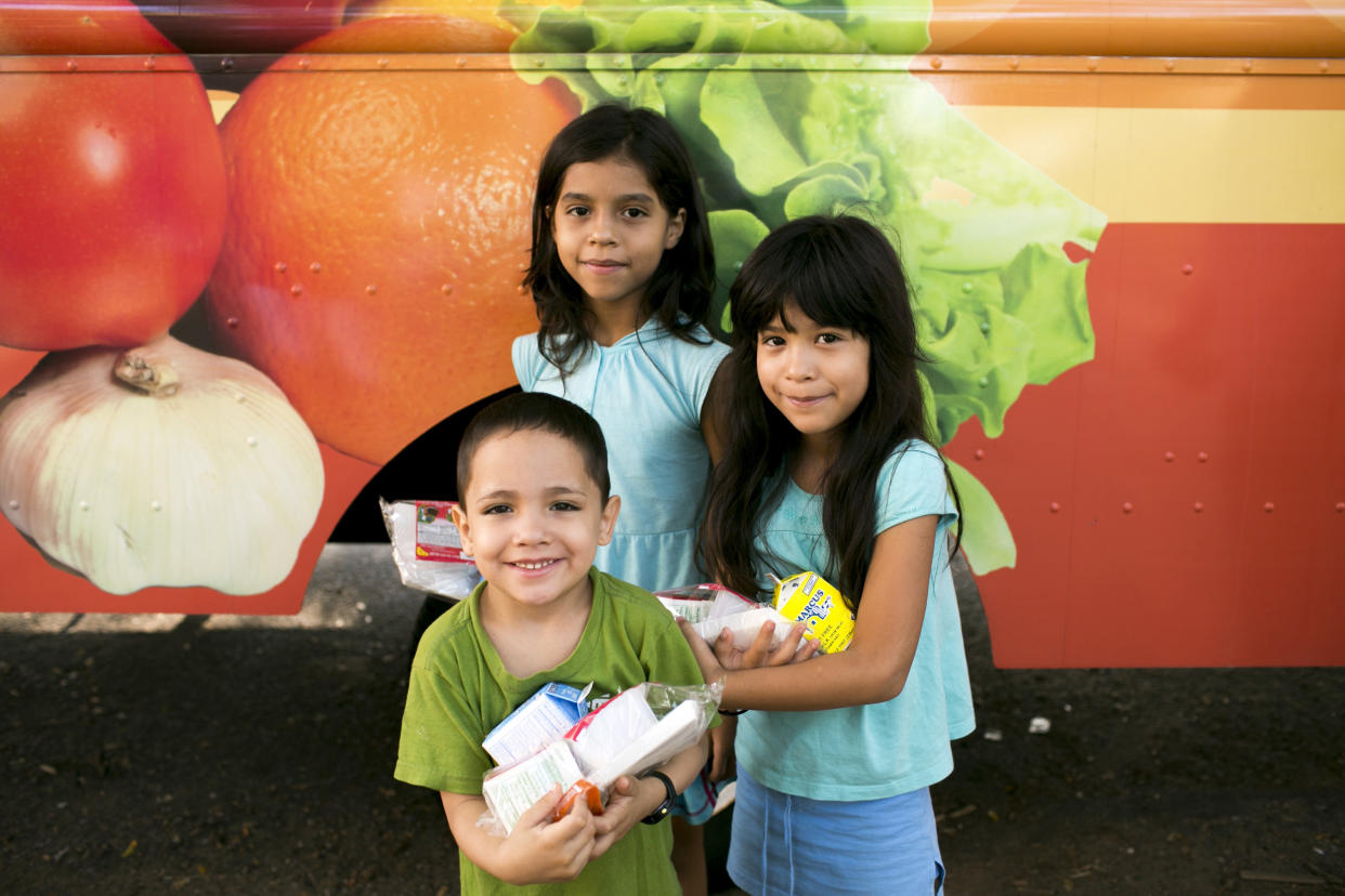 Children in Greater New Haven receive summer meals through food truck distribution. Food trucks are often used by schools and community groups to reach kids and teens with summer meals. (Courtesy Share our Strength)