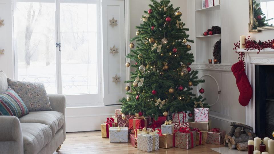 christmas tree surrounded with gifts