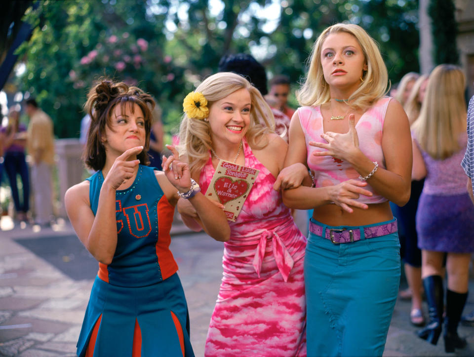 three friends on a college campus