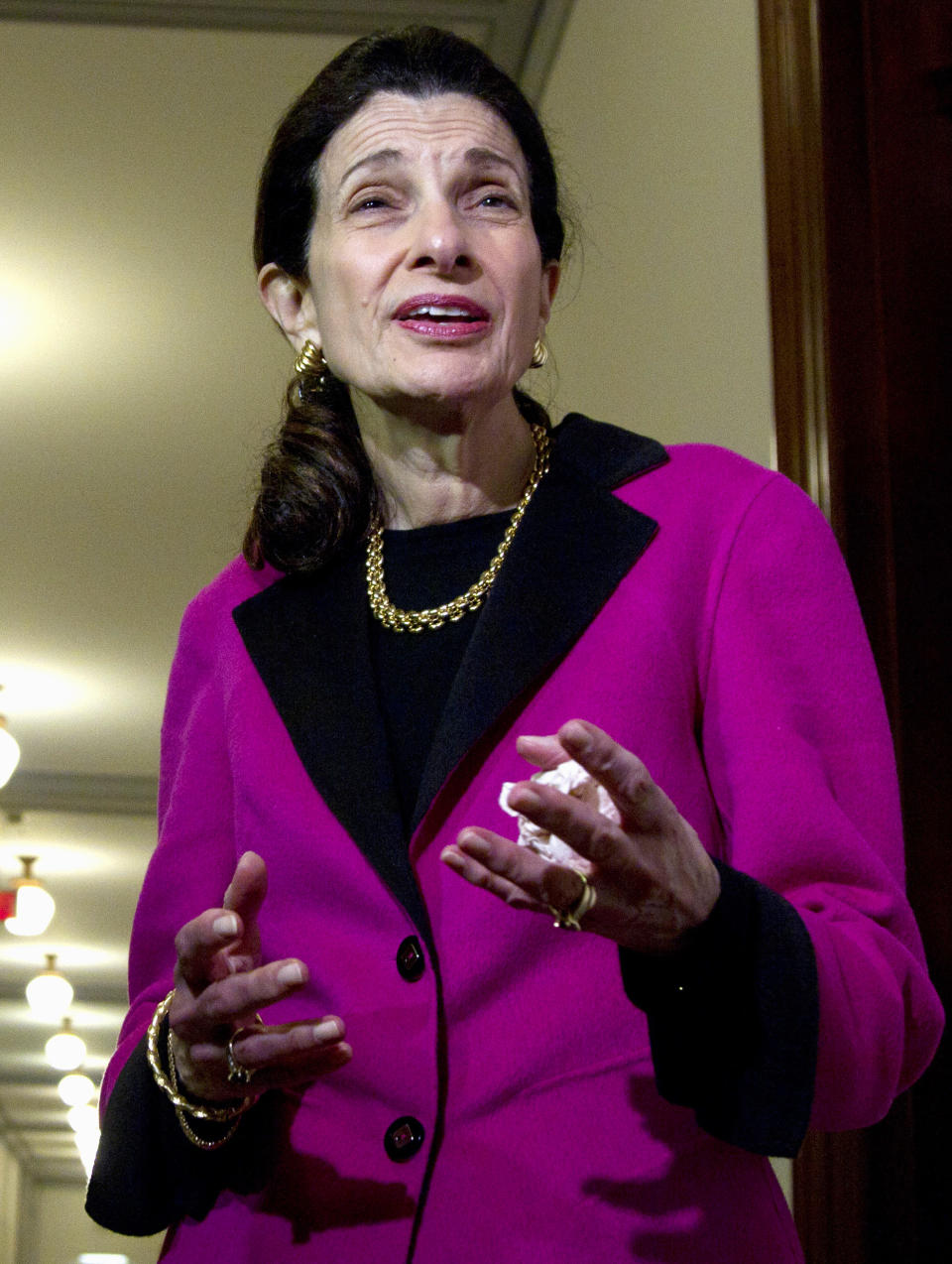 FILE - In this Feb. 28, 2012 file photo, Sen. Olympia Snowe, R-Maine speaks outside her office on Capitol Hill in Washington. (AP Photo/Carolyn Kaster, File)