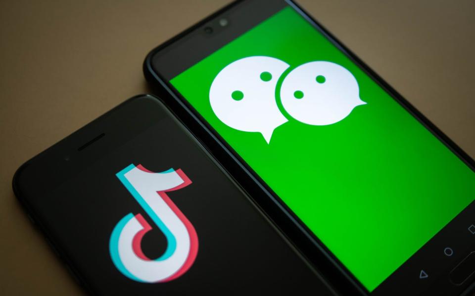 President Trump sparked Chinese fury when he announced a US ban on the social media giants WeChat, right, and TikTok - Ivan Abreu/Bloomberg