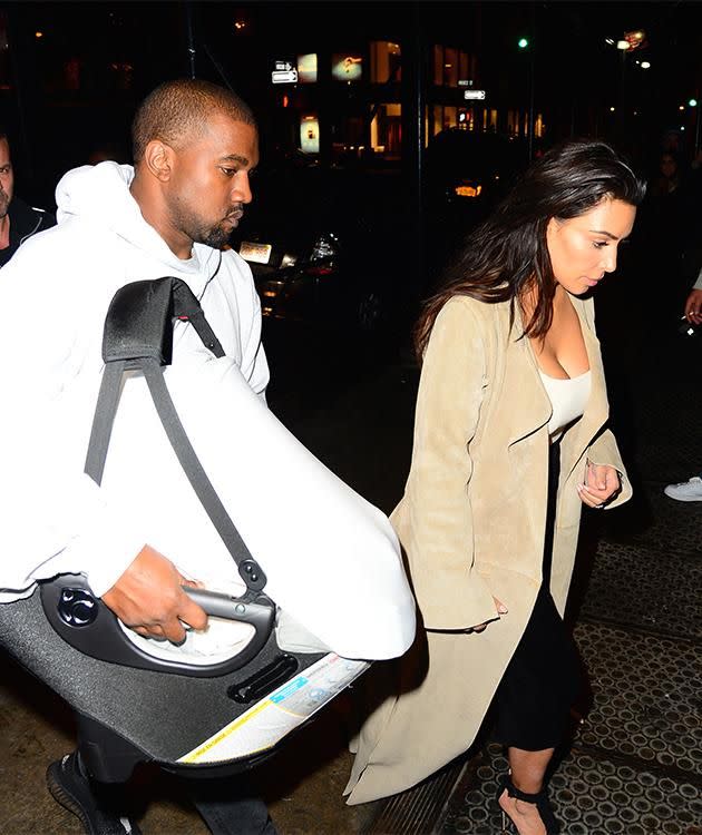 Kim, Kanye and Saint West. Photo: Getty