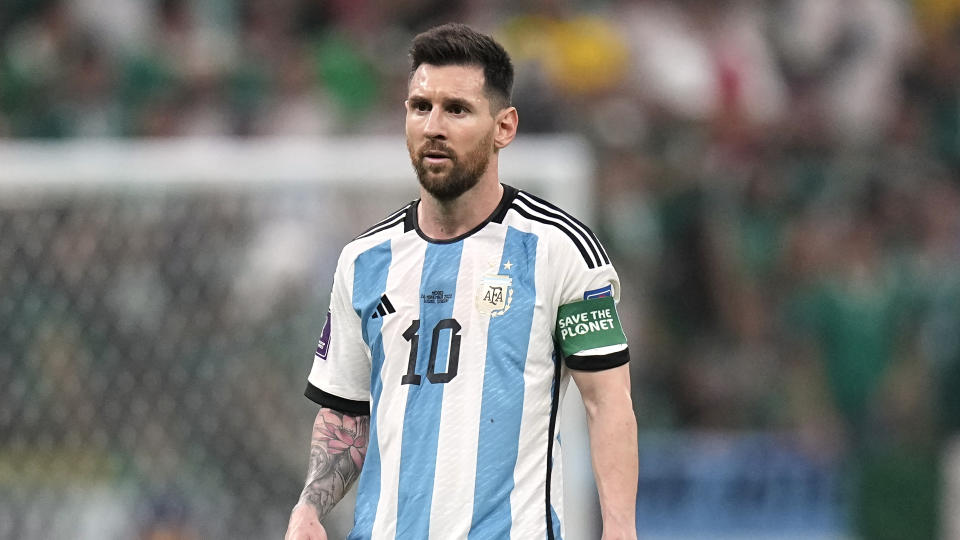 Argentina's Lionel Messi watches play during the World Cup group C soccer match between Argentina and Mexico at the Lusail Stadium in Lusail, Qatar, Saturday, Nov. 26, 2022. (AP Photo/Ariel Schalit)