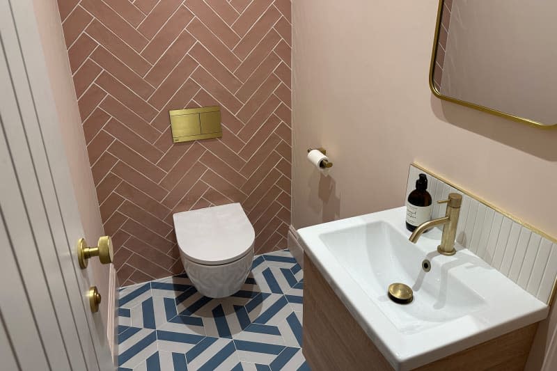Colorfully renovated powder room.