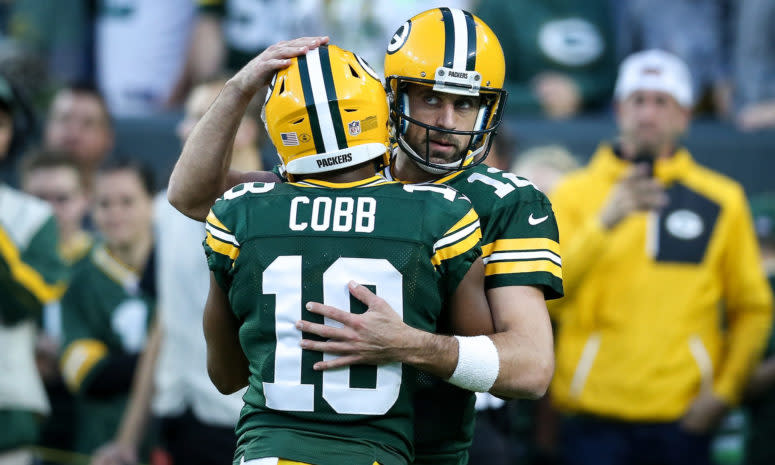 Aaron Rodgers hugs Randall Cobb during a Green Bay Packers vs. Chicago Bears game.