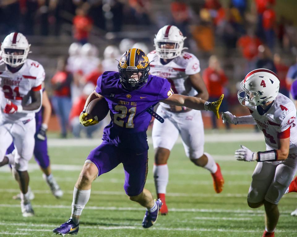 Noah Long stiff-arms his way to the end zone for Liberty  Hill against Crosby during Class 5A semifinal action Dec. 10 at Bryan, TX. Liberty Hill punched their ticket to the state championship game with a 42-14 victory over Crosby. 