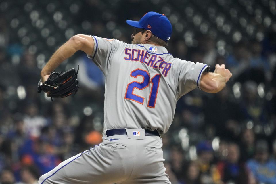 New York Mets starting pitcher Max Scherzer throws during the first inning of a baseball game against the Milwaukee Brewers Tuesday, April 4, 2023, in Milwaukee. (AP Photo/Morry Gash)