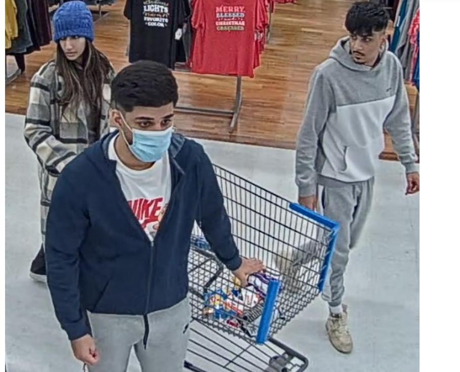 Security images taken from the Walmart on Post Road in Warwick that authorities say show the group accused of planting skimming devices to steal customers' credit card and PIN numbers