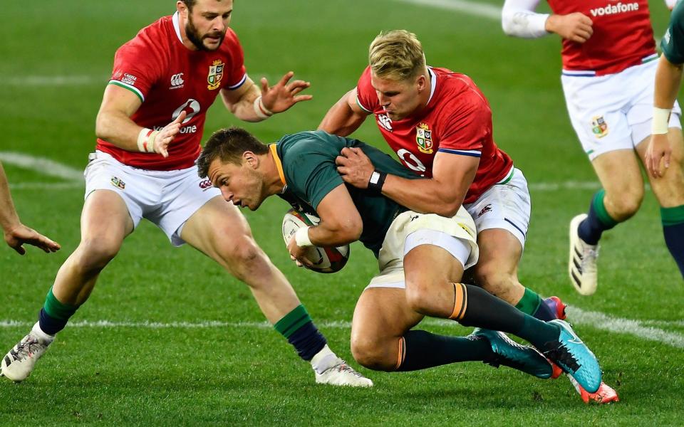 Handré Pollard of South Africa is tackled by Duhan van der Merwe  - SPORTSFILE