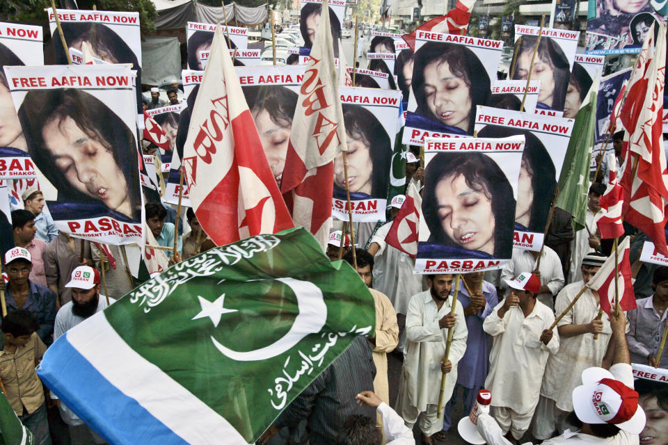 FILE - Protesters rally near the U.S. consulate in Karachi, Pakistan on Thursday, Sept. 23, 2010, to condemn the arrest of alleged Al-Qaida suspect Aafia Siddiqui. (AP Photo/Shakil Adil, File)