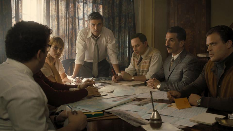 In <em>Operation Finale</em>, Oscar Isaac, standing, stars as Mossad agent Peter Malkin, who led a team of Israeli spies who tracked down and captured the notorious Adolf Eichmann (played by Ben Kingsley) 15 years after World War II. (Photo: <span>Automatik Entertainment</span>)