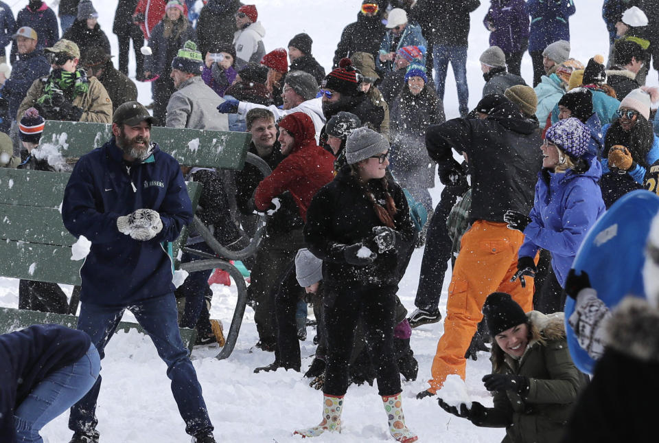 Several hundred people take part in a public snowball fight, Saturday, Feb. 9, 2019, at Wright Park in Tacoma, Wash. Word of the friendly battle spread on social media Friday night and Saturday, as a winter storm that blanketed Washington state with snow moved south into Oregon and meteorologists warned that yet more winter weather was on the way. (AP Photo/Ted S. Warren)