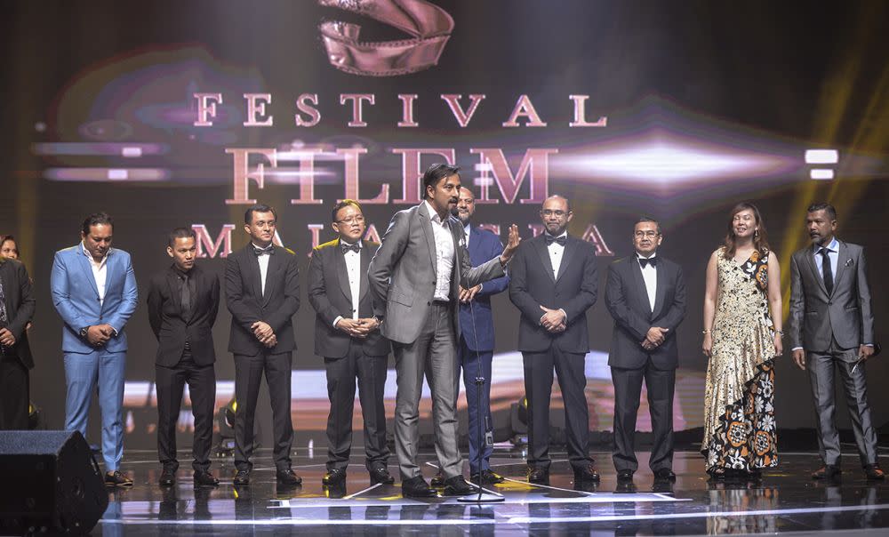 ‘One Two Jaga’ producer and actor Bront Palarae taking to stage to receive the Best Film Award. — Picture by Shafwan Zaidon