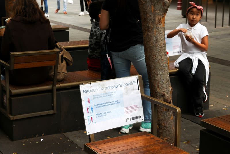 A sign is seen on a bench following the easing of restrictions implemented to curb the spread of the coronavirus disease (COVID-19) in Sydney