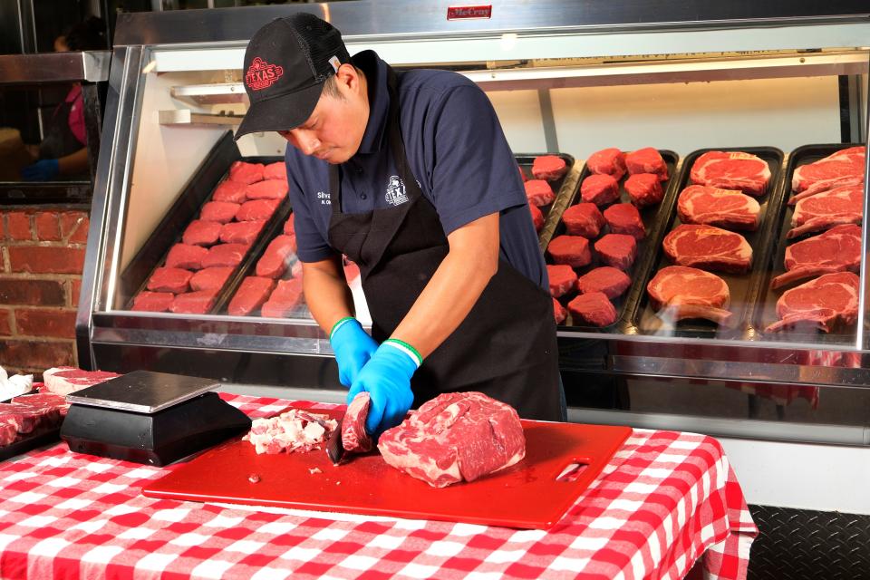 Texas Roadhouse employee and National Meat Cutting Challenge finalist Silvano Vicente is able to judge the correct weight of a steak by eye after more than 12 years of meat cutting.