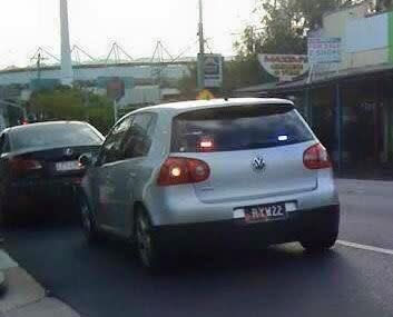 This light grey Volkswagen Golf is an undercover cop car. Photo: Facebook