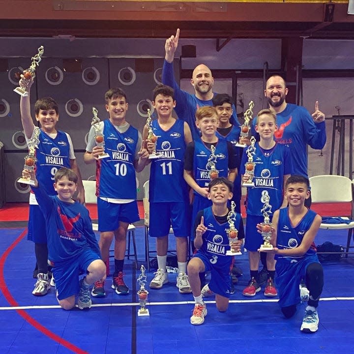 The Red Bulls sponsored by Bassett Cricket Ranch won the 2022 NJB 5th/6th Grade Division Championship on Feb. 27 with a 31-19 victory over the Clippers, concluding a 9-1 season. The championship team, front row, left to right: Jackson McCullar, Jaden Herrera, Tysen Bassett; middle row: Adam Childress, Andrew Plyman, Elijah Amaro, Pierce Ramos, Luke Gocke; back row: assistant coach Chris Gocke, Andrew “AJ” Ruvalcaba, and head coach Russell Bassett. Not Pictured: Christian Cobos.