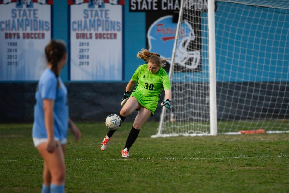 Freshman keeper Emory Jennings (30) helped lead J.L. Mann girls soccer to a 1-0 victory against Mauldin for the Class AAAAA Upper State championship game on Wednesday, May 10, 2023.