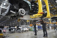 Workers assemble electric cars at a Vinfast factory in Hai Phong, Vietnam, on Sept. 29, 2023. Vietnamese automaker VinFast just can’t sell enough cars, so it's hoping its tiniest and cheapest car yet — a roughly 10-foot-long mini-SUV priced at $9,200 and called the VF3 — will become Vietnam's “national car" and win over consumers in Asian markets. (AP Photo/Hau Dinh)