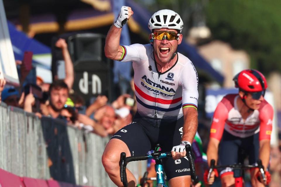 Astana Qazaqstan Teams British rider Mark Cavendish celebrates as he crosses the finish line to win the twentyfirst and last stage of the Giro dItalia 2023 cycling race 135 km in and around Rome on May 28 2023 Photo by Luca Bettini  AFP Photo by LUCA BETTINIAFP via Getty Images