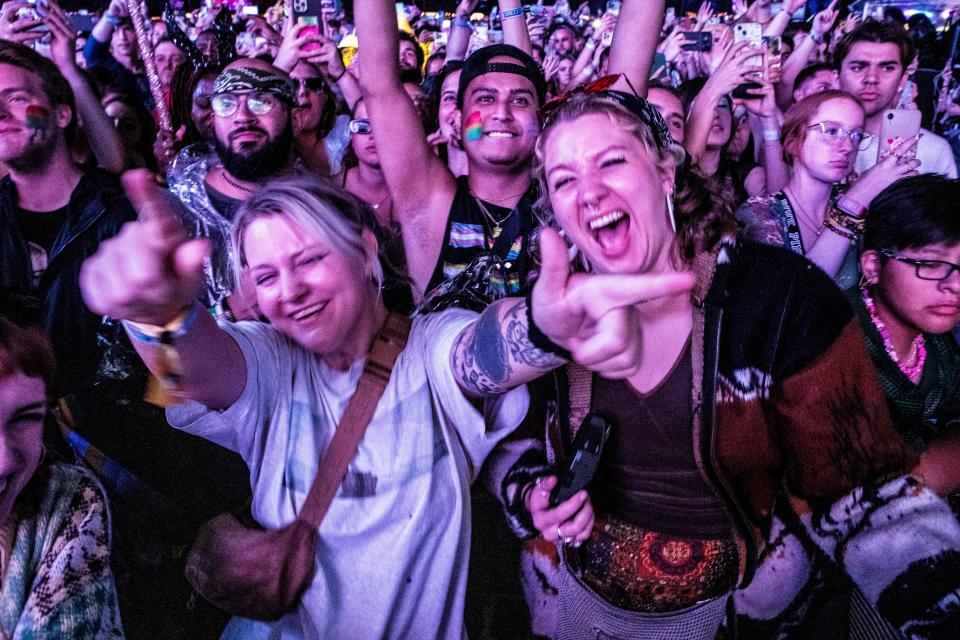 Fans react to T-Pain's performance during his set on the Firefly main stage on Day 4, the final day of the 2022 Firefly Music Festival in Dover, Sunday, Sept. 25, 2022. T-Pain's performance was nearly cancelled when the threat of severe weather conditions forced a temporary evacuation of all participants from the venue.