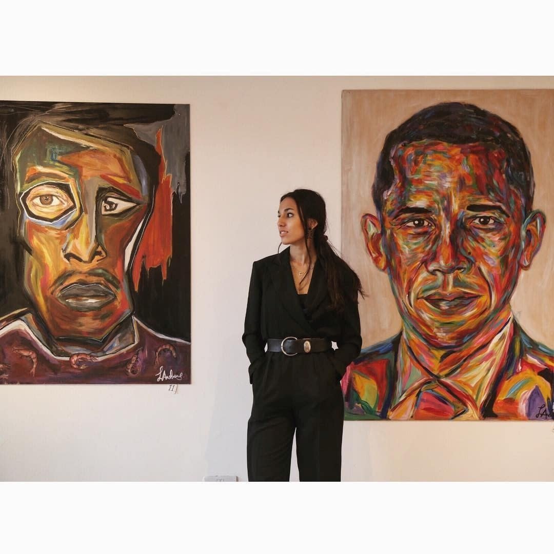 Artist Layla Andrews with her portrait of Barack Obama (Layla Andrews)
