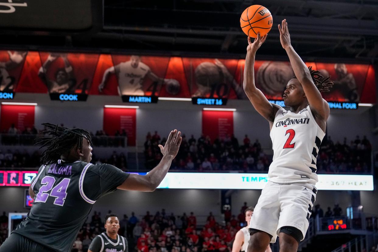 Jizzle James had 10 points off the bench to help UC defeat Kansas State Saturday, March 2.