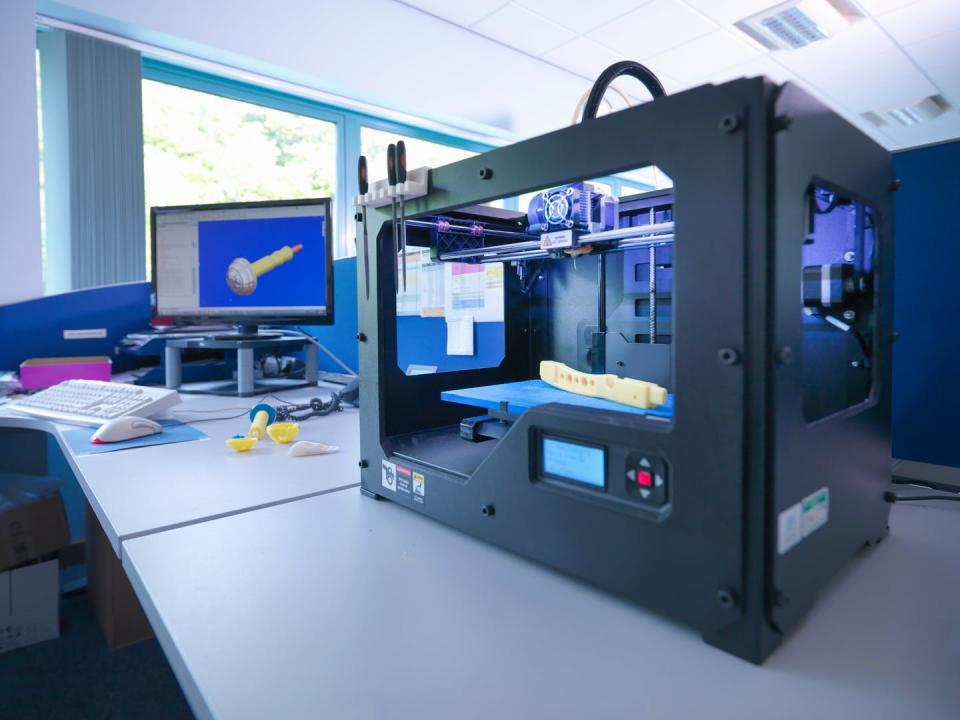 <span class="caption">3D printers turn digital designs into toys, household items and even medical equipment.</span> <span class="attribution"><a class="link " href="https://www.gettyimages.com/detail/photo/printing-machine-with-cad-design-on-screen-in-royalty-free-image/571978289?adppopup=true" rel="nofollow noopener" target="_blank" data-ylk="slk:Monty Rakusen/Cultura via Getty Images;elm:context_link;itc:0;sec:content-canvas">Monty Rakusen/Cultura via Getty Images</a></span>