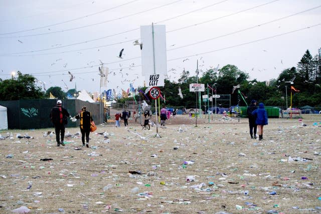 Gulls fly over waste left at Worthy Farm