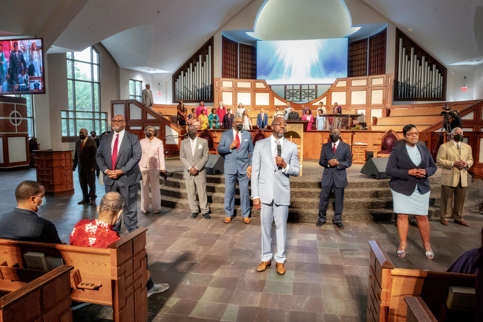 Warnock stands before the congregation at Ebenezer’s Sunday Service, May 8<span class="copyright">Wayne Lawrence for TIME</span>