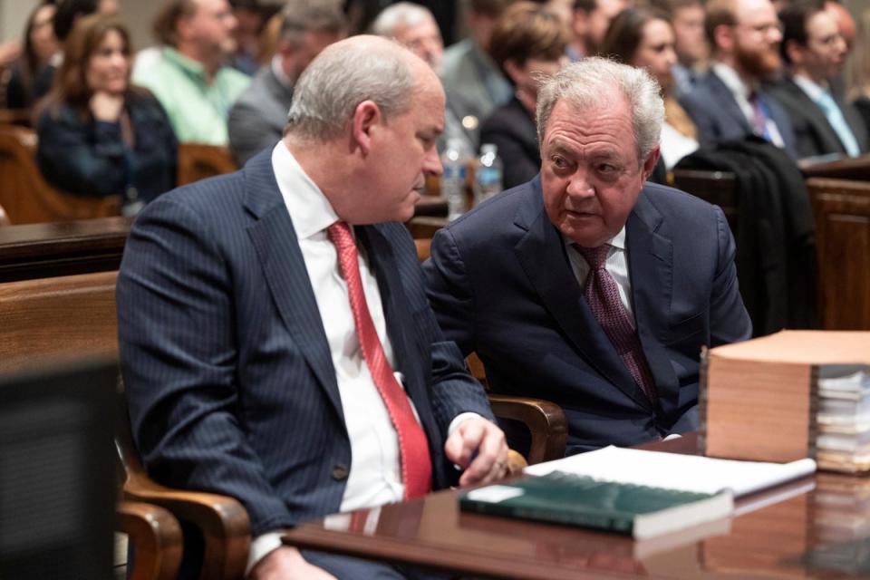 Defence attorney Dick Harpootlian, right, and defence attorney Jim Griffin speak after their client Alex Murdaugh is found guilty earlier this year (AP)