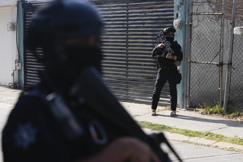 Municipal police officers on patrol in a neighborhood of Celaya, Mexico, Wednesday, Feb. 28, 2024. Most of Celaya’s municipal police force are former member of the federal police, earning the nickname “Fedepales,” a combination of the word “federal” and “municipal.” (AP Photo/Fernando Llano)