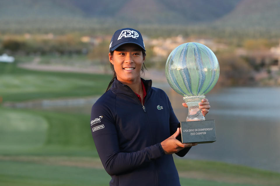 Celine Boutier holds her LPGA trophy