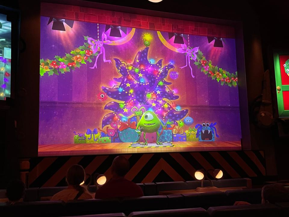 holiday overlay at the monsters inc laugh floor attraction at disney world