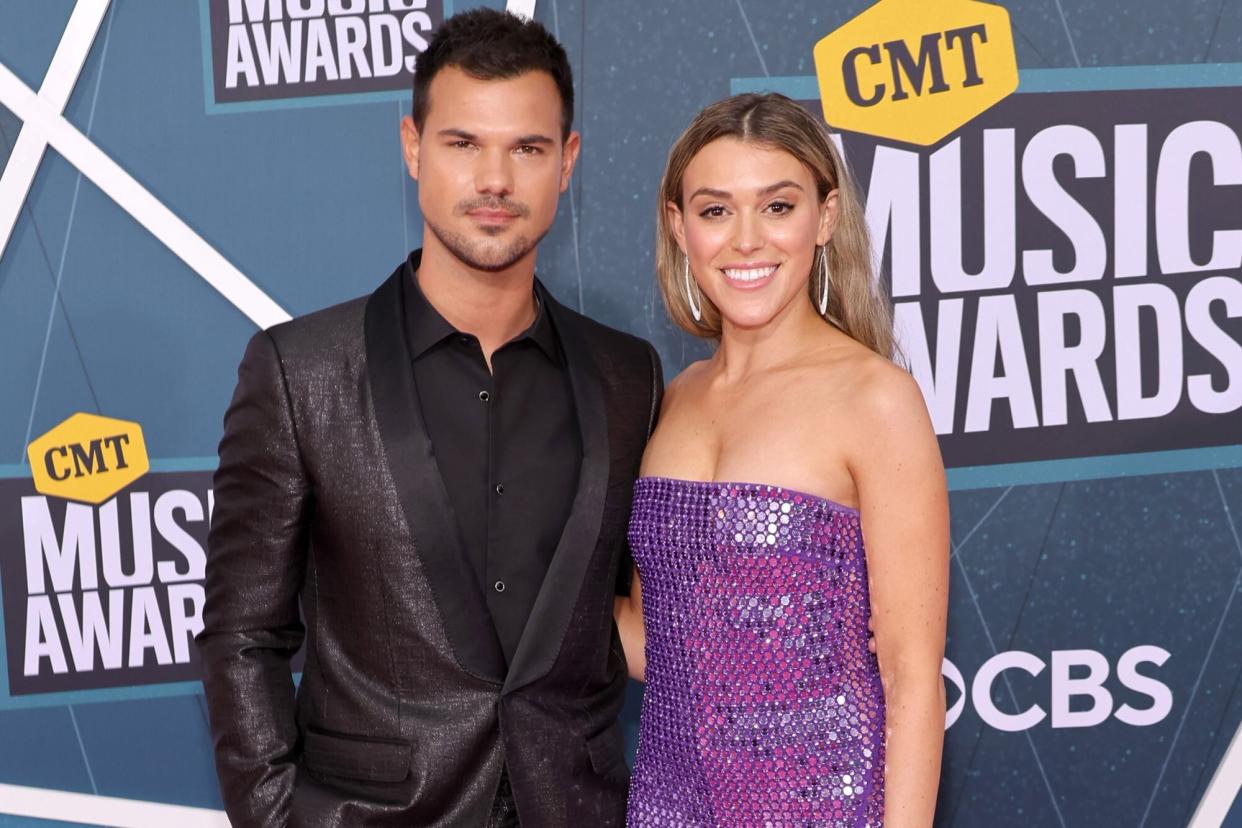 NASHVILLE, TENNESSEE - APRIL 11: Taylor Lautner and Taylor Dome attend the 2022 CMT Music Awards at Nashville Municipal Auditorium on April 11, 2022 in Nashville, Tennessee. (Photo by Mike Coppola/Getty Images)