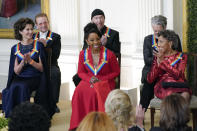 The 2022 Kennedy Center Honorees react as President Joe Biden recognizes Gladys Knight, center, during the Kennedy Center honorees reception at the White House in Washington, Sunday, Dec. 4, 2022. Front row from left, Amy Grant, Gladys Knight, and Tania León, and back row from left, Irish band U2 members Bono, The Edge, and Adam Clayton. (AP Photo/Manuel Balce Ceneta)