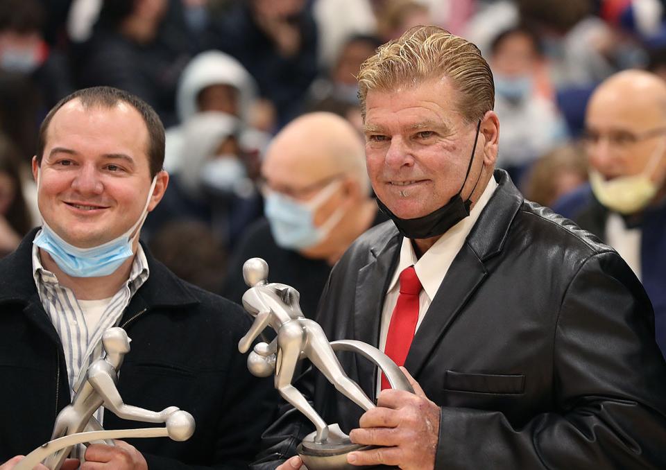 Kyle Costa, left, and Mike Leith, of Quincy, were inducted into the school's Hall of Fame during halftime of the North Quincy/Quincy basketball game Friday, January 21, 2022.