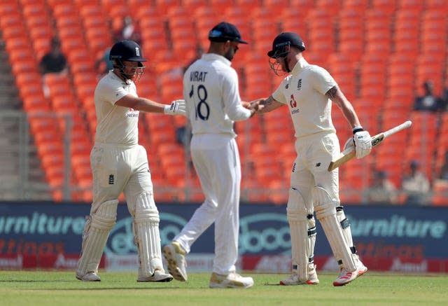 Jonny Bairstow shakes Ben Stokes' hand