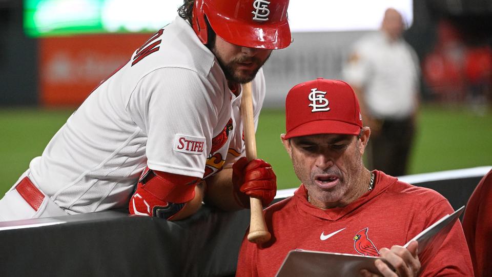 ST LOUIS, MISSOURI - AUGUST 15: Alec Burleson #41 of the St. Louis Cardinals speaks with Hitting Coach Turner Ward #49 of the St. Louis Cardinals during a game against the Oakland Athletics at Busch Stadium on August 15, 2023 in St Louis, Missouri. (Photo by Joe Puetz/Getty Images)