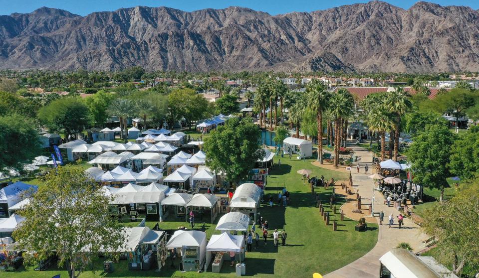 People enjoy beautiful weather and art on the first day of the La Quinta Art Celebration at the La Quinta Civic Center Park, Nov. 10, 2022. The event, featuring 200 artists from 31 states and six countries, continues through Sunday.