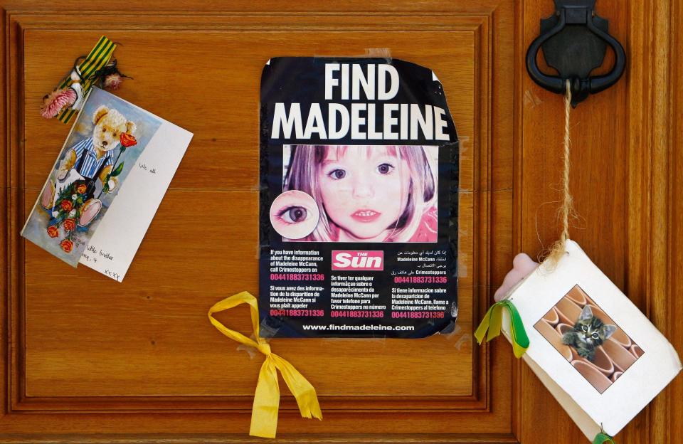 LAGOS, PORTUGAL - AUGUST 09: A poster and cards are placed on the Church door in Praia da Luz for missing Madeleine McCann August 9, 2007 in Praia da Luz, Portugal. Police continue there investigation in the Algarve village after blood was found in the McCann Apartment. (Photo by Jeff J Mitchell/Getty Images)