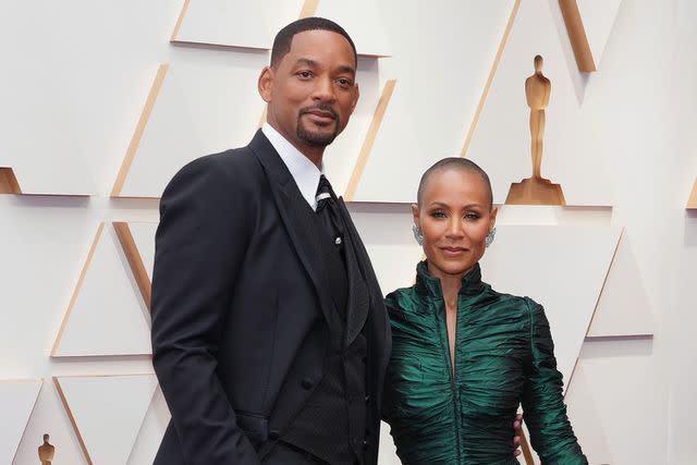 <p>Kevin Mazur/WireImage</p> Will Smith and Jada Pinkett Smith attend the Academy Awards in 2022