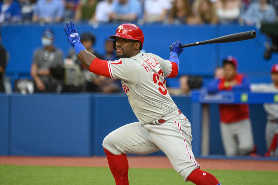 Philadelphia Phillies watches his single against the Toronto Blue Jays during the second inning of a baseball game Tuesday, July 12, 2022, in Toronto. (Christopher Katsarov/The Canadian Press via AP)