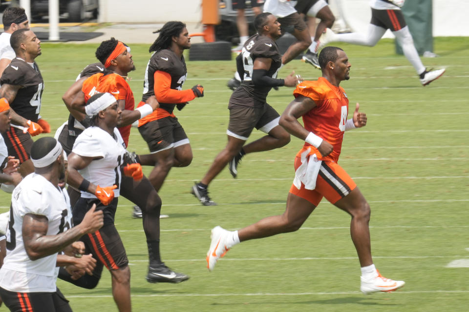 Cleveland Browns quarterback Deshaun Watson (4) runs with the team during an NFL football training camp practice in White Sulfur Springs, W.Va., Saturday, July 27, 2024. (AP Photo/ Sue Ogrocki)