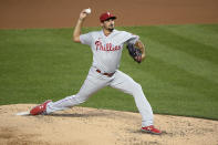 Philadelphia Phillies starting pitcher Zach Eflin winds up during the fourth inning of the team's baseball game against the Washington Nationals, Wednesday, Sept. 23, 2020, in Washington. (AP Photo/Nick Wass)