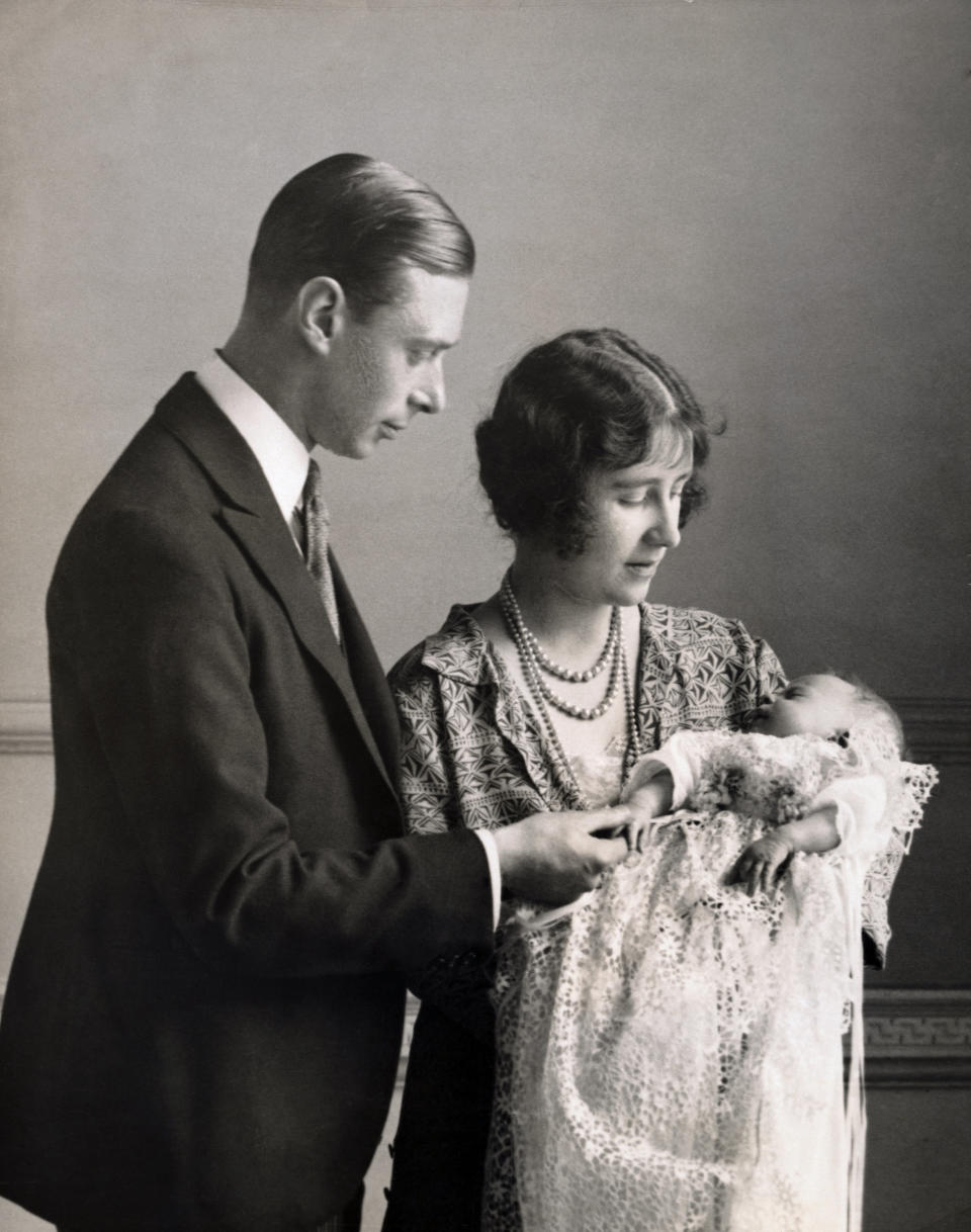 The Duke and Duchess of York with their baby daughter, the future Queen Elizabeth II, after her christening in the private chapel at Buckingham Palace in May 1926.