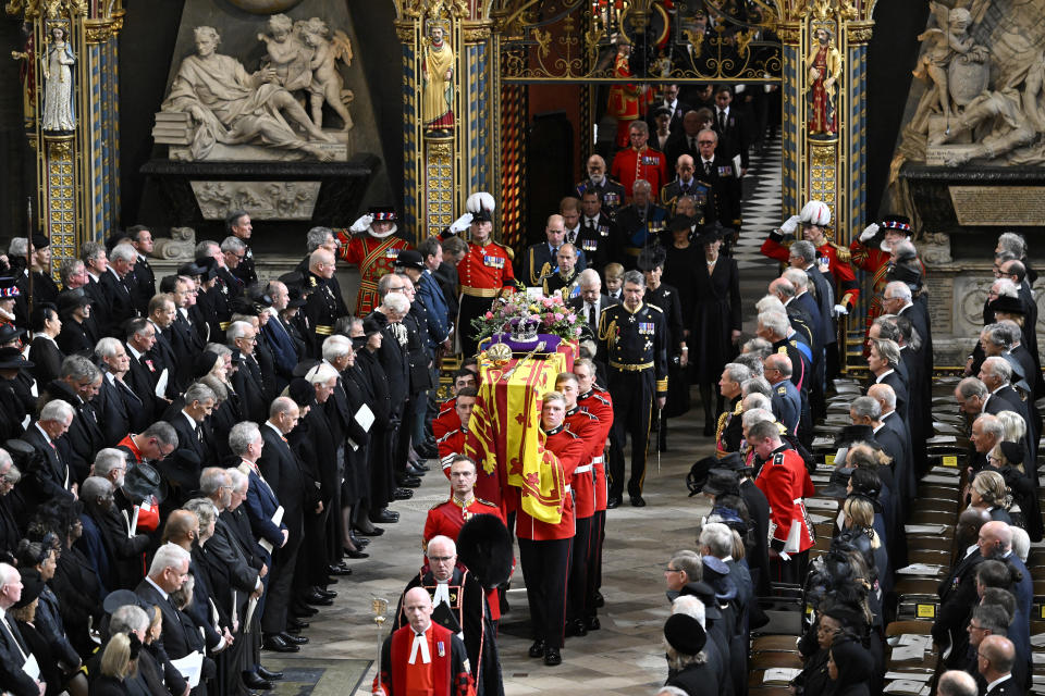 <p>LONDON, ENGLAND - SEPTEMBER 19: The coffin of Queen Elizabeth II with the Imperial State Crown resting on top of it departs Westminster Abbey during the State Funeral of Queen Elizabeth II on September 19, 2022 in London, England. Elizabeth Alexandra Mary Windsor was born in Bruton Street, Mayfair, London on 21 April 1926. She married Prince Philip in 1947 and ascended the throne of the United Kingdom and Commonwealth on 6 February 1952 after the death of her Father, King George VI. Queen Elizabeth II died at Balmoral Castle in Scotland on September 8, 2022, and is succeeded by her eldest son, King Charles III. Gareth Cattermole/Pool via REUTERS</p> 
