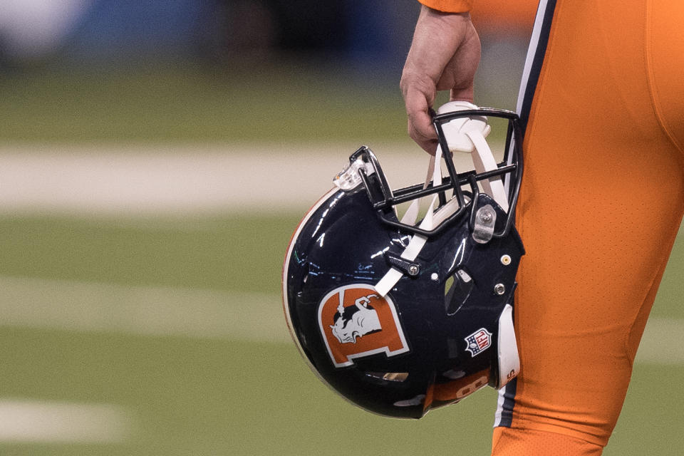 INDIANAPOLIS, IN - DECEMBER 14: Denver Broncos color rush uniforms with old logo on the helmet before the NFL game between the Denver Broncos and Indianapolis Colts on December 14, 2017, at Lucas Oil Stadium in Indianapolis, IN. (Photo by Zach Bolinger/Icon Sportswire via Getty Images)